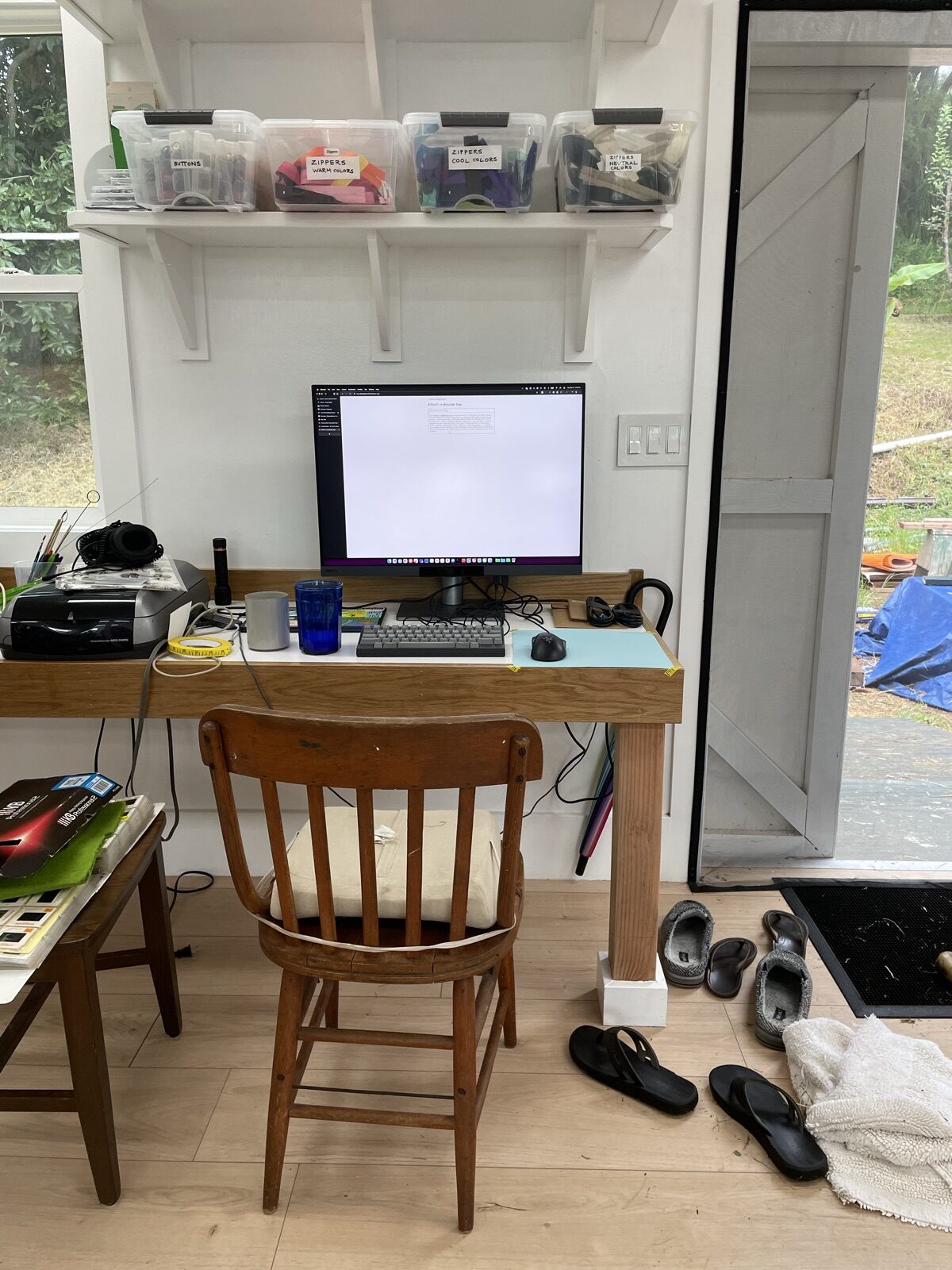 My desk in the barn, with this log on the screen